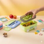 Kitty Car-Shaped Double-Layer Lunch Box for Kids | Cute Toy Car Tiffin Box with Cutlery, Fruit Tray & Lock Seals | Leakproof School Lunch Box